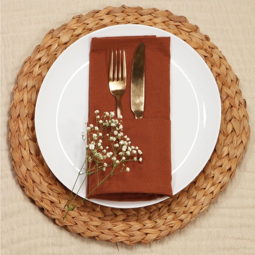Set of 20 Rust colored formal napkins ready for their next wedding or event